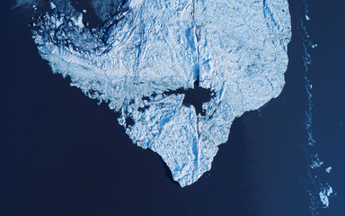 Melting ice cap from above, drone photography, global warming concept - Powered by Adobe