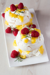 Elegant double pavlova with berries