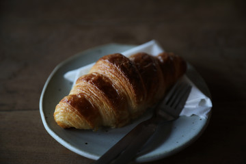 croissant on wood background