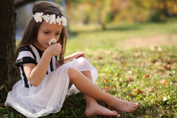 Little princess girl daydreaming