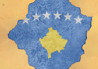 Kosovo state flag broken material facade structure in big concrete cracked hole