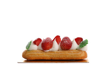Choux cream with strawberry isolated in white background