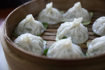 Fototapeta na wymiar Dim sum dumpling on bamboo basket , Chinese food