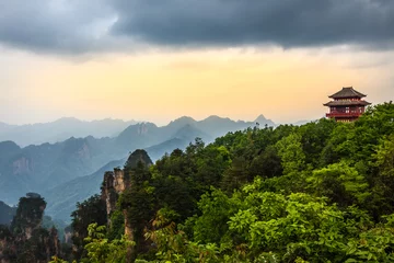 Foto auf Acrylglas Pagoda on the hill with mountains in the background and forest in the foreground,  Zhangjiajie national park, Hunan province, China © vadim.nefedov