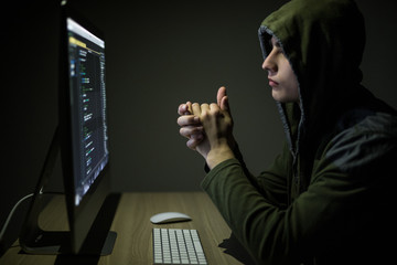 Dangerous Hooded Hacker Breaks into Government Data Servers and Infects Their System with a Virus....