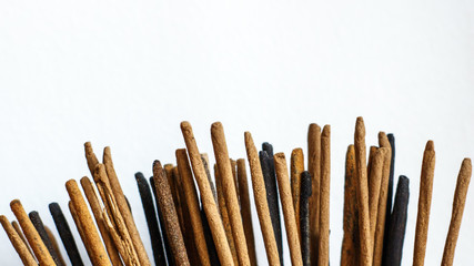 aromatic sticks for spa treatments on white background