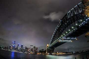 Fototapeta na wymiar Fisheye image of Sydney Harbor Bridge at night, Australia.
