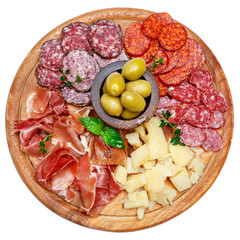 Meat and cheese plate with salami sausage, chorizo, parma and parmesan cheese