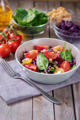 Spinach salad with chickpeas and veggies, healthy food, vegetarian and vegan snack, clean eating, diet, detox