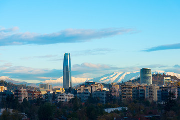 Skyline of residential buildings at Las Condes district with snowed hills in the back, Santiago de Chile