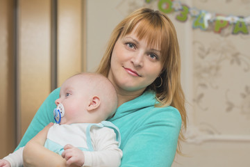mother with child on hands