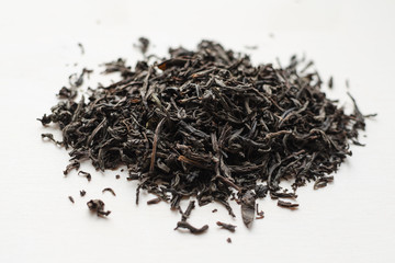 Dry black tea leaves heap