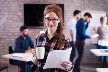 Young attractive architect working in modern office