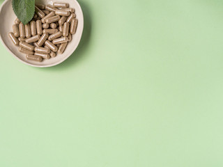 Capsule pills in a plate