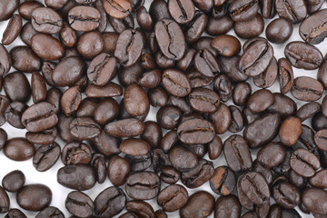 coffee beans background scattered on white background 