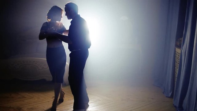 Beautiful couple dancing salsa