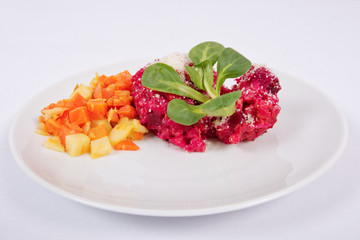 Risotto with red beet on a white