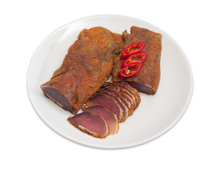 Partly sliced cured pork tenderloin and chili