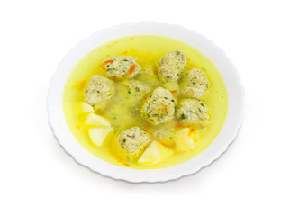 Chicken meatballs soup in the white dish