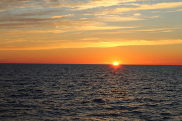Sunset against the background of water