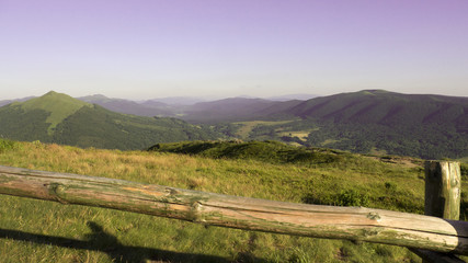 Panoramic wiev of a valley Bieszczady Mountains. Nearly sunset in summer. - obrazy, fototapety, plakaty