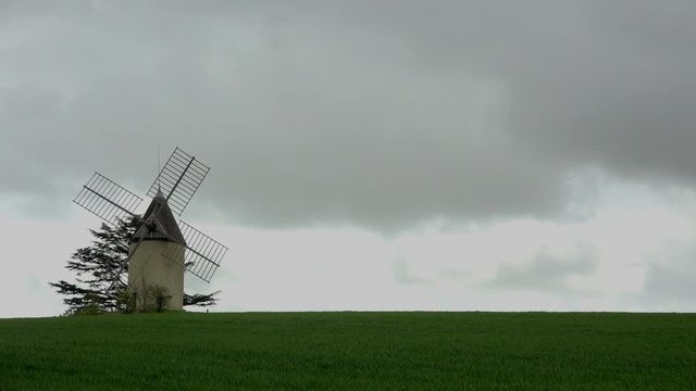 Timelapse, mill in a field of alfalfa, Lot et Garonne, 47, France