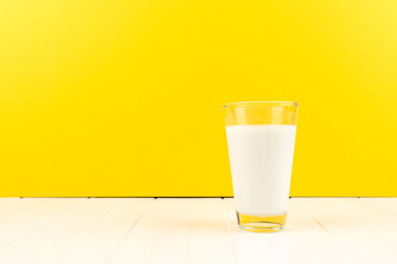 yellow background with milk glass