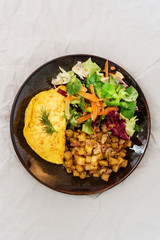 French Omelette with Potatoes, Mushroom and Salad