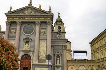 Turin, Italy, Piedmont April 08 2018. The façade of the Basilica of Mary Help of Christians. Sanctuary erected by St. John Bosco as a monument of gratitude to the Virgin Mary, with title AUSILIATRICE
