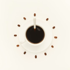 Black coffee cup and roasted beans forming clock dial isolated o