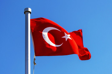 Bright Turkish flag waving in the wind