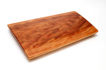 Isolated cutting board for use as a background.