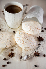 Light cookies with cup of coffee