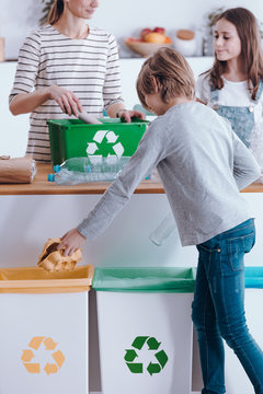 Family sorting waste