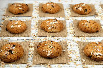 Homemade cookies on a white vintage table. Tasty cookies and biscuits.