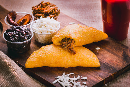 Pavilion empanadas that includes: black beans, bananas, cheese and meat