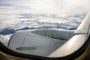 Fototapeta na wymiar cloudscape view from airplane window