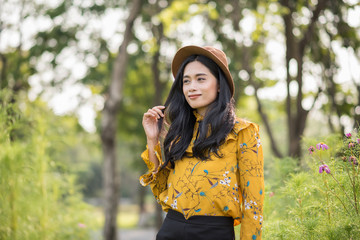 Portrait of happy Bohemian girl in park