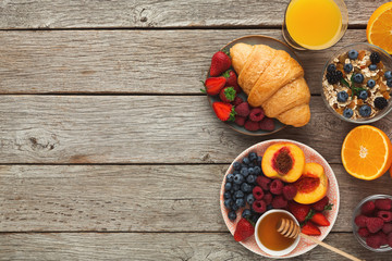 Fresh crusty croissants and orange juice for morning meals