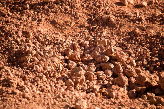 Red Clay Soil On Nature As A Background