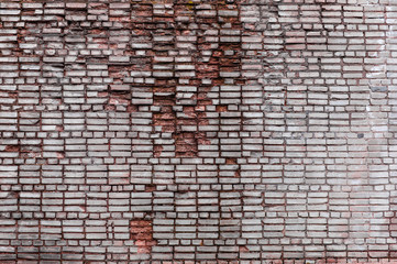 ancient weathered rusty red brick wall, dirty abstract background