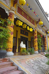 Fototapeta na wymiar The entrance to the Chua Phap Bao Pagoda in the historic UNESCO listed central Vietnamese town of Hoi An 