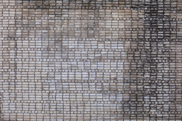 ancient weathered rough gray brick wall, old dirty abstract background