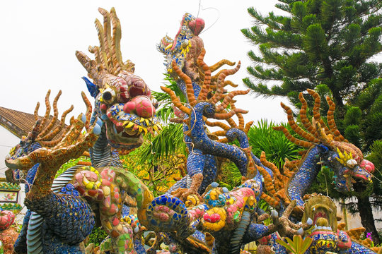 Detail from a pond depicting dragons in the grounds of the Cantonese Assembly Hall, also known as Quang Trieu, in the historic UNESCO listed central Vietnamese town of Hoi An

