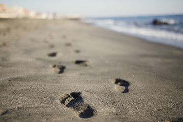 soft human footprints on sand
