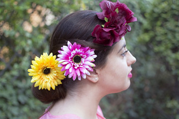 Naklejka premium beautiful woman with flowers in her hair
