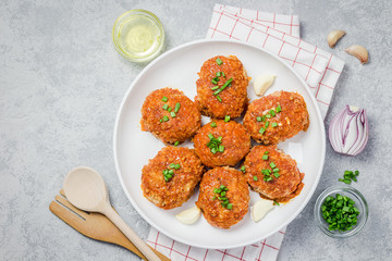 Healty vegetable cutlets in baking dish. Top view, space for text.