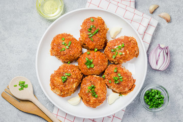 Healty vegetable cutlets in baking dish. Top view, space for text.