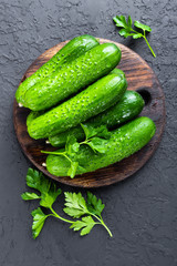 Cucumbers. Fresh cucumbers on wooden board