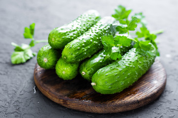 Cucumbers. Fresh cucumbers on wooden board